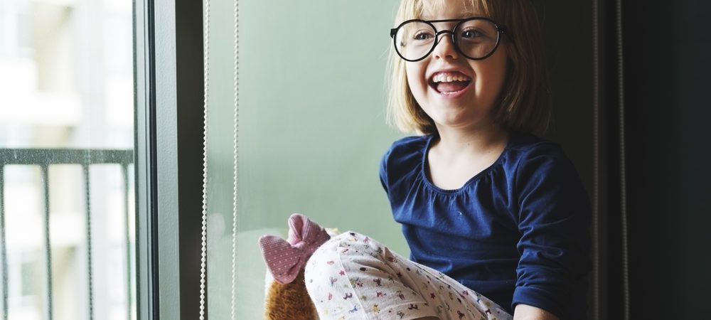 young child with glasses